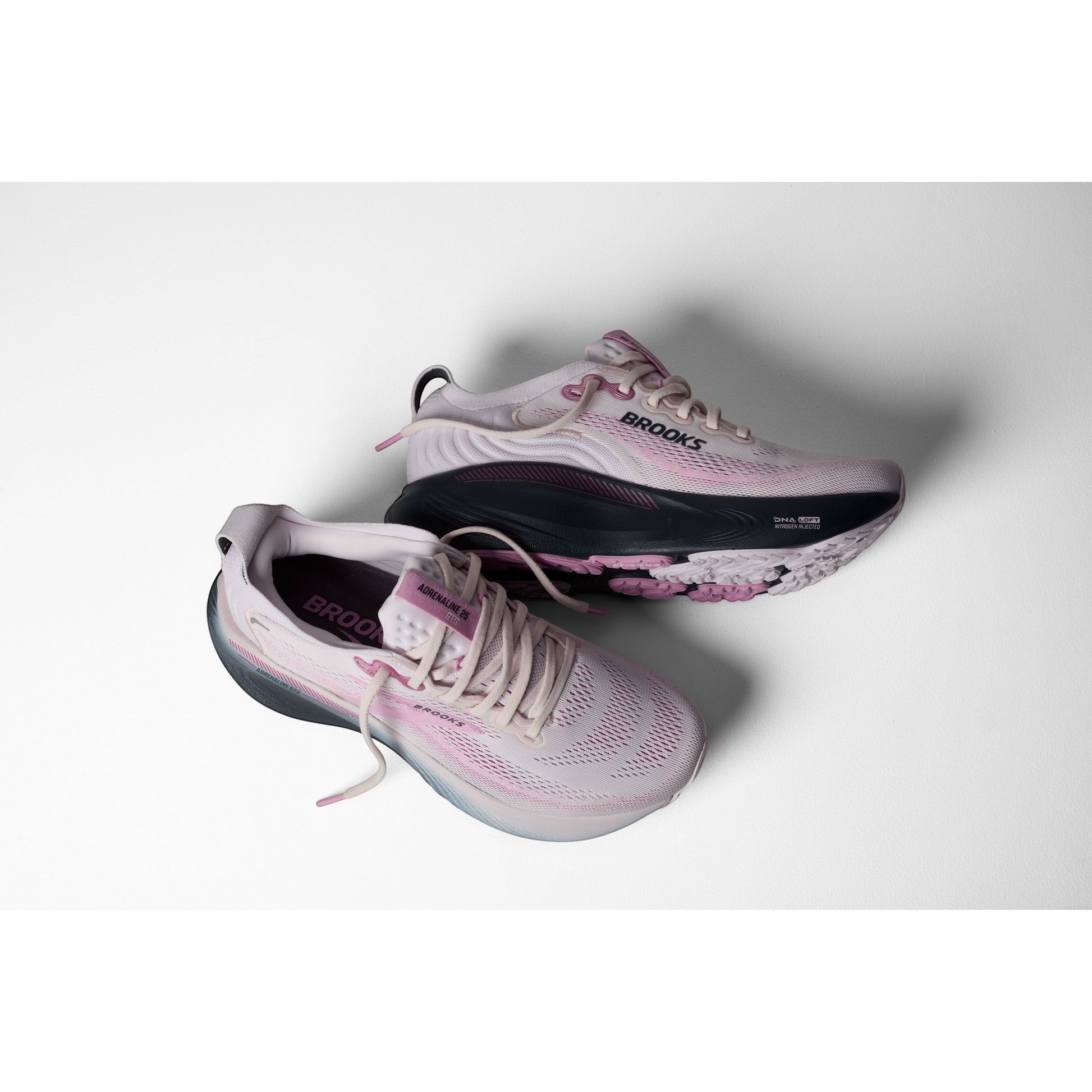 Allen's Bootery Women's Adrenaline 25 mauve and pink breathable mesh running shoes with dark navy accents and pink sole details.