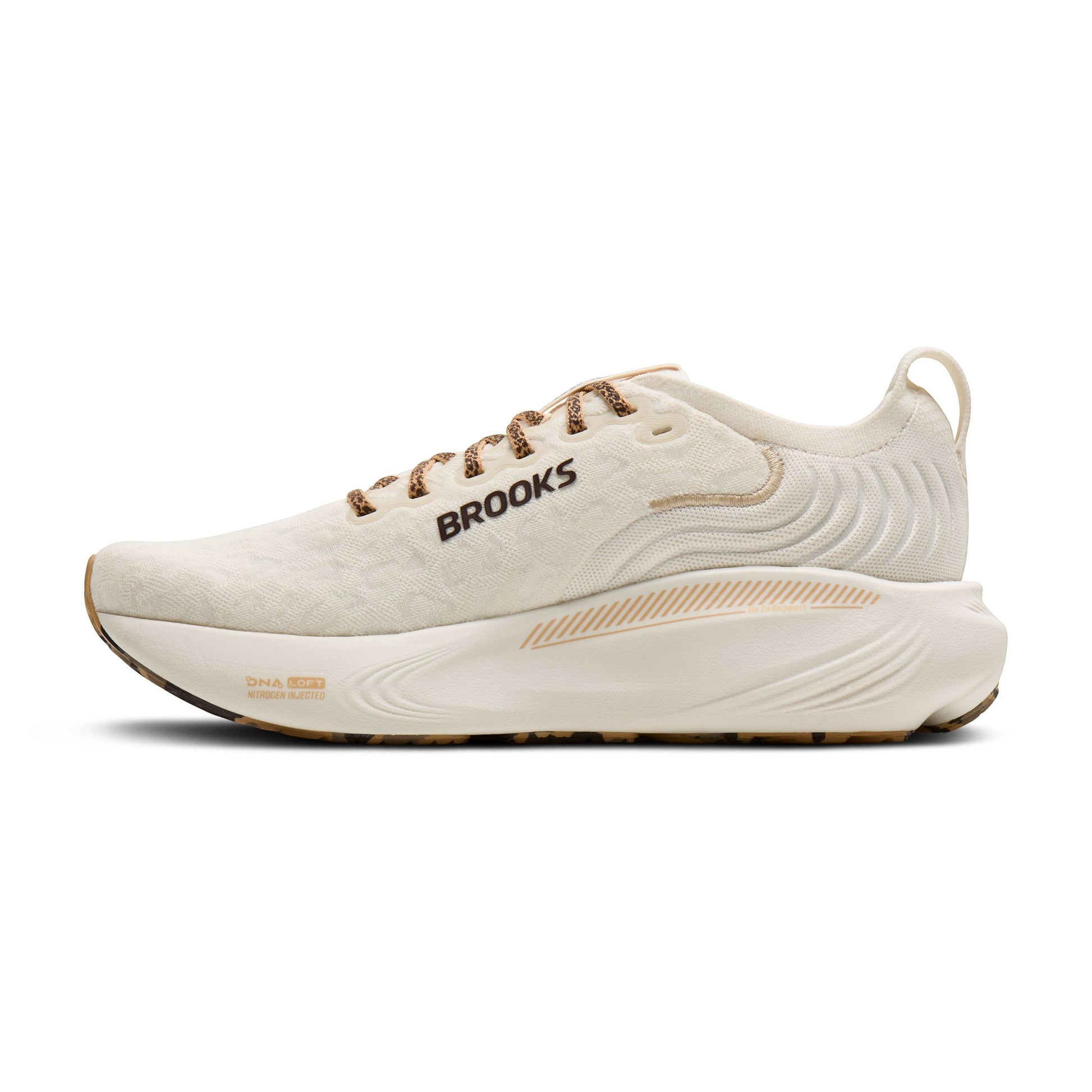 Allen's Bootery Women's Adrenaline 25 running shoes in cream with tan accents and laces. Features breathable upper and supportive cushioning.