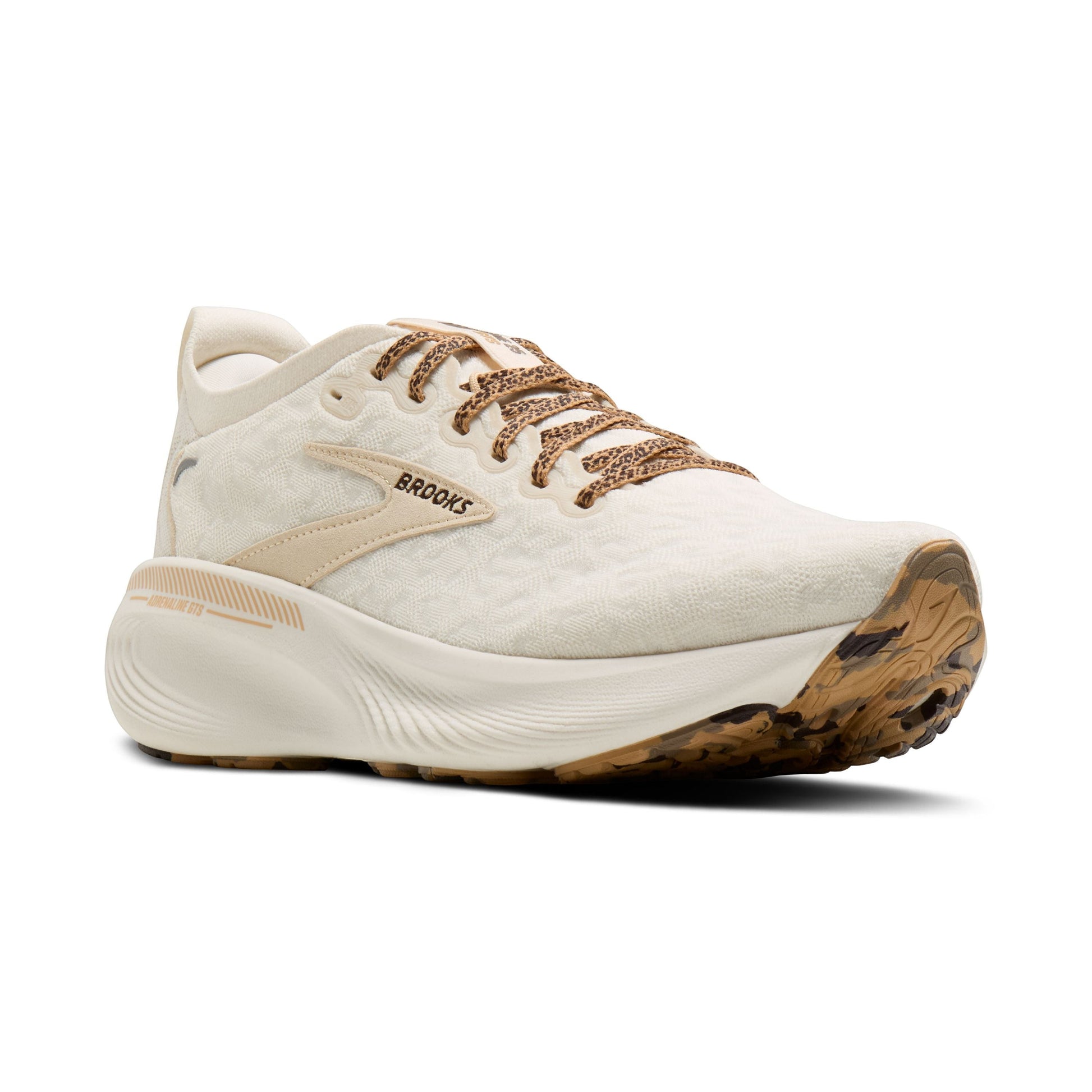 Allen's Bootery Women's Adrenaline 25 running shoes in cream with tan laces and a patterned sole. Features breathable upper.