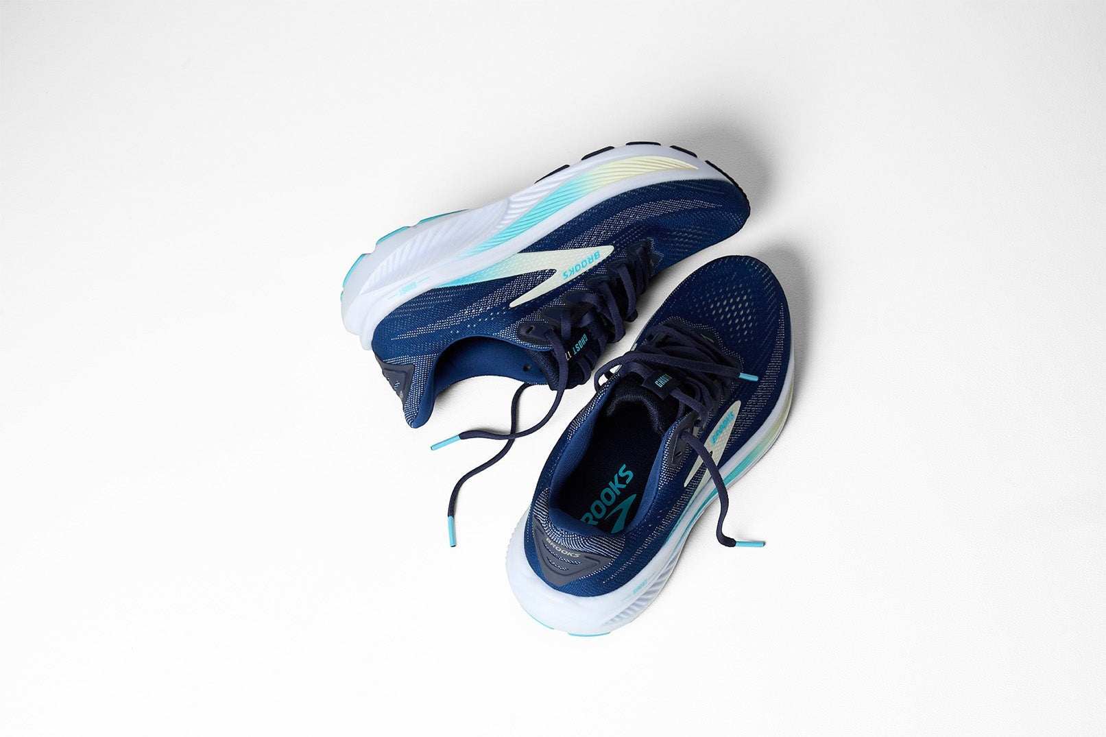 Allen's Bootery Women's Ghost 17 navy, green, and turquoise running shoes with updated structure and enhanced cushioning.