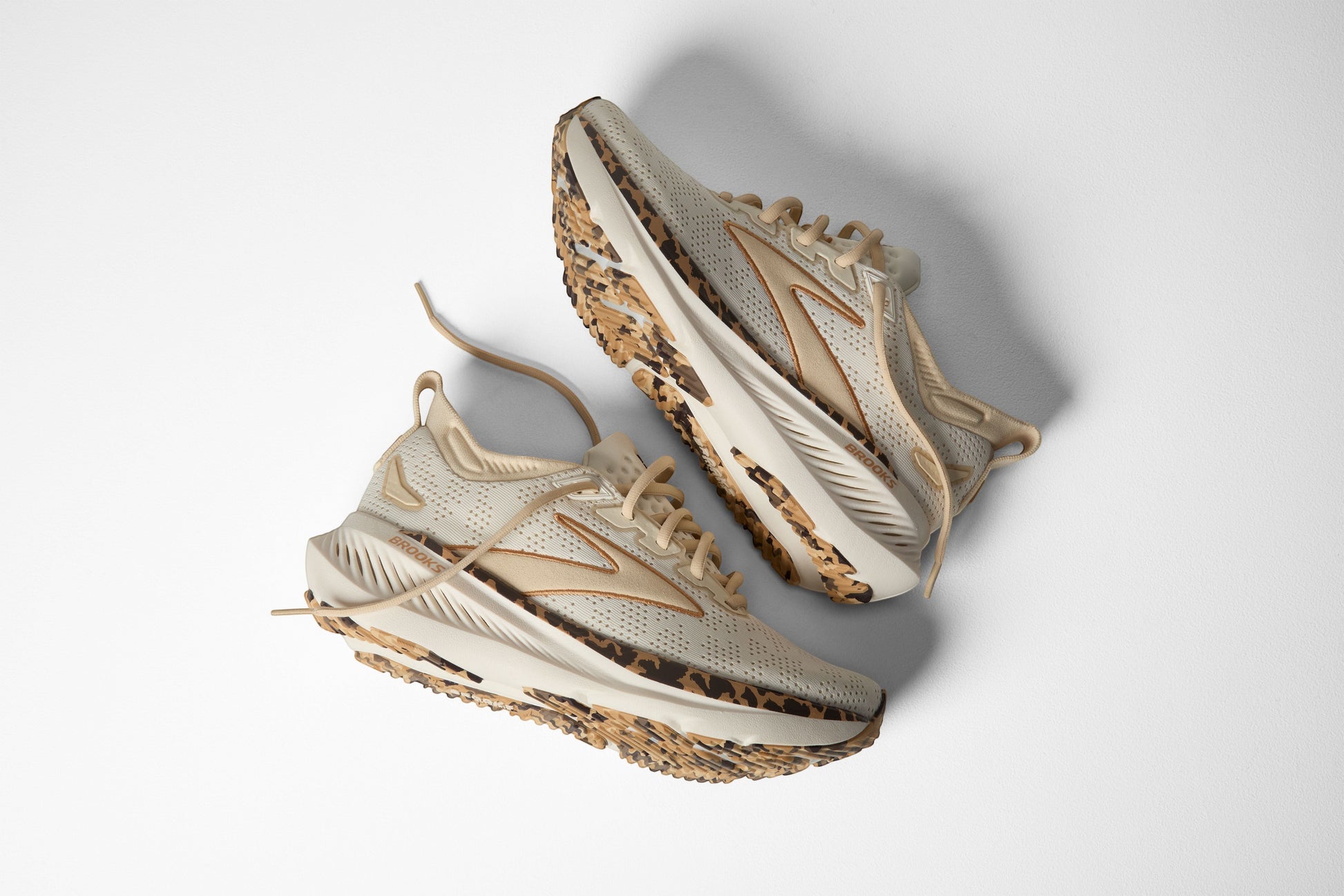 Allen's Bootery Women's Glycerin 23 running shoes in tofu, creme, and chocolate with leopard print accents on the sole.