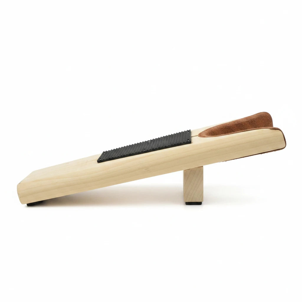 Allen's Bootery wooden boot jack with a suede-lined yoke and textured rubber grip pad for easy footwear removal.