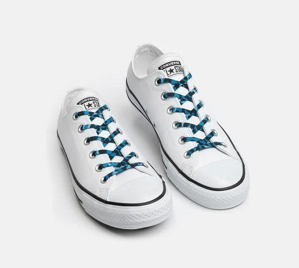 Allen's Bootery Xpand blue camo no-tie elastic laces installed on white low-top sneakers