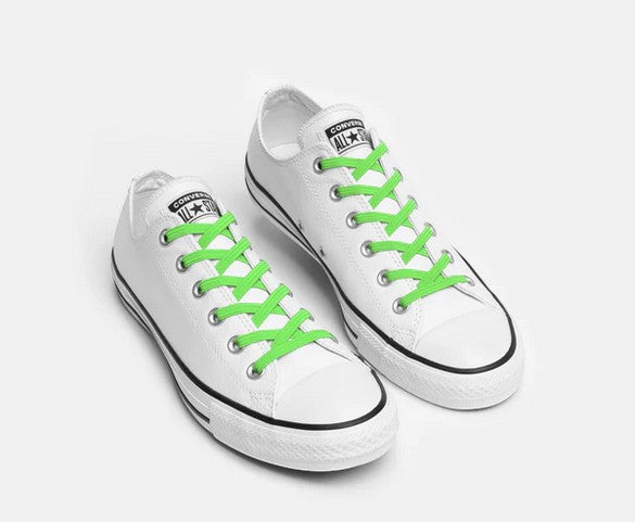 Allen's Bootery Xpand Laces Original neon green elastic no-tie laces installed on white low-top sneakers