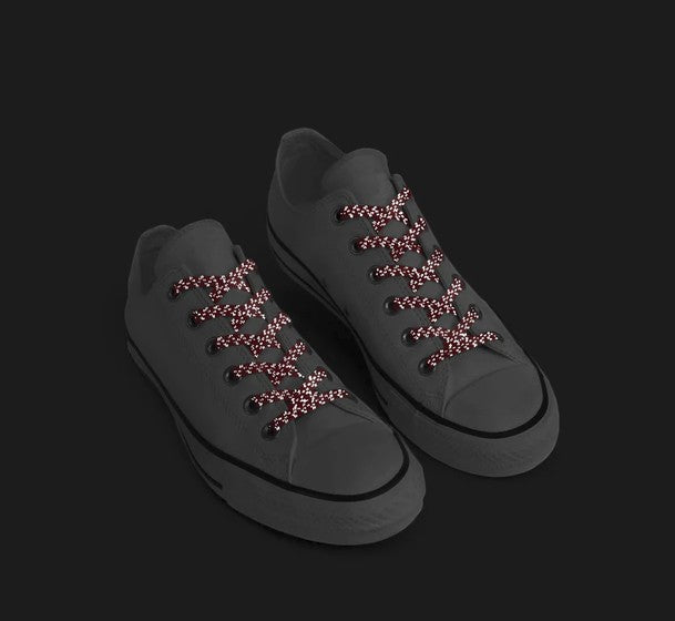 Allen's Bootery Xpand Original no-tie elastic shoelaces in red reflective pattern on grey sneakers