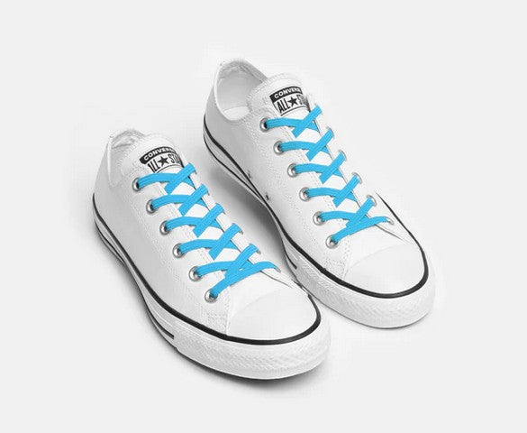 Allen's Bootery Xpand Laces Original no-tie elastic laces in sky blue installed on white low-top sneakers
