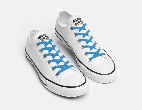 Allen's Bootery Xpand Original no-tie elastic laces in true blue installed on white low-top sneakers