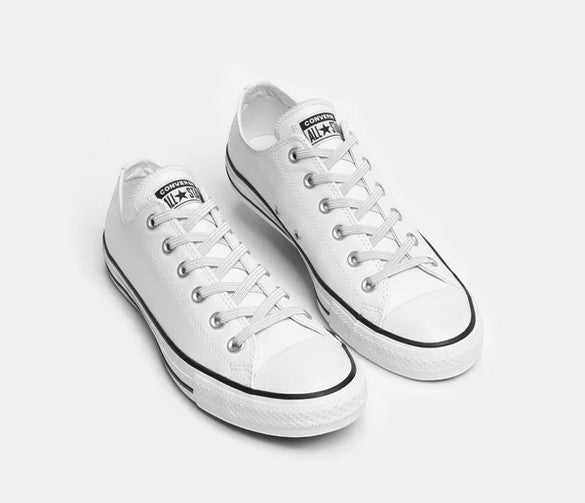 Allen's Bootery Xpand Laces Original white elastic no-tie laces installed on white low-top canvas sneakers