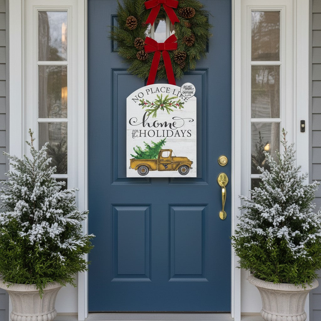 Allen's Bootery 16x22 inch weather-resistant holiday sign with yellow truck design hanging on a blue front door.