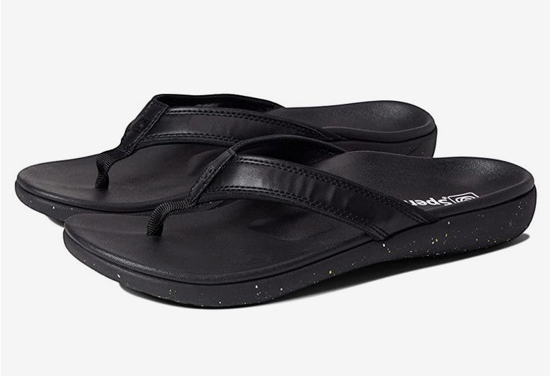 Allen's Bootery Yumi Nuevo Speckled women's black orthotic flip-flops with slim straps and speckled sole detail.